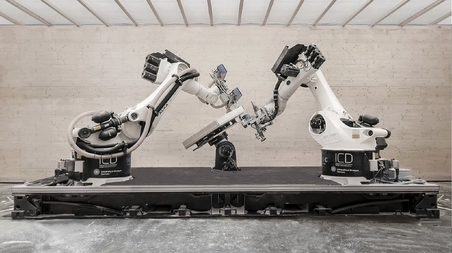 Figure 06 - Flexible and transportable robotic timber construction platform (TIM), consisting of a pick-and-place robot, central turntable and a glue-nail-mill (GNM) robot (Wagner et al, 2020).