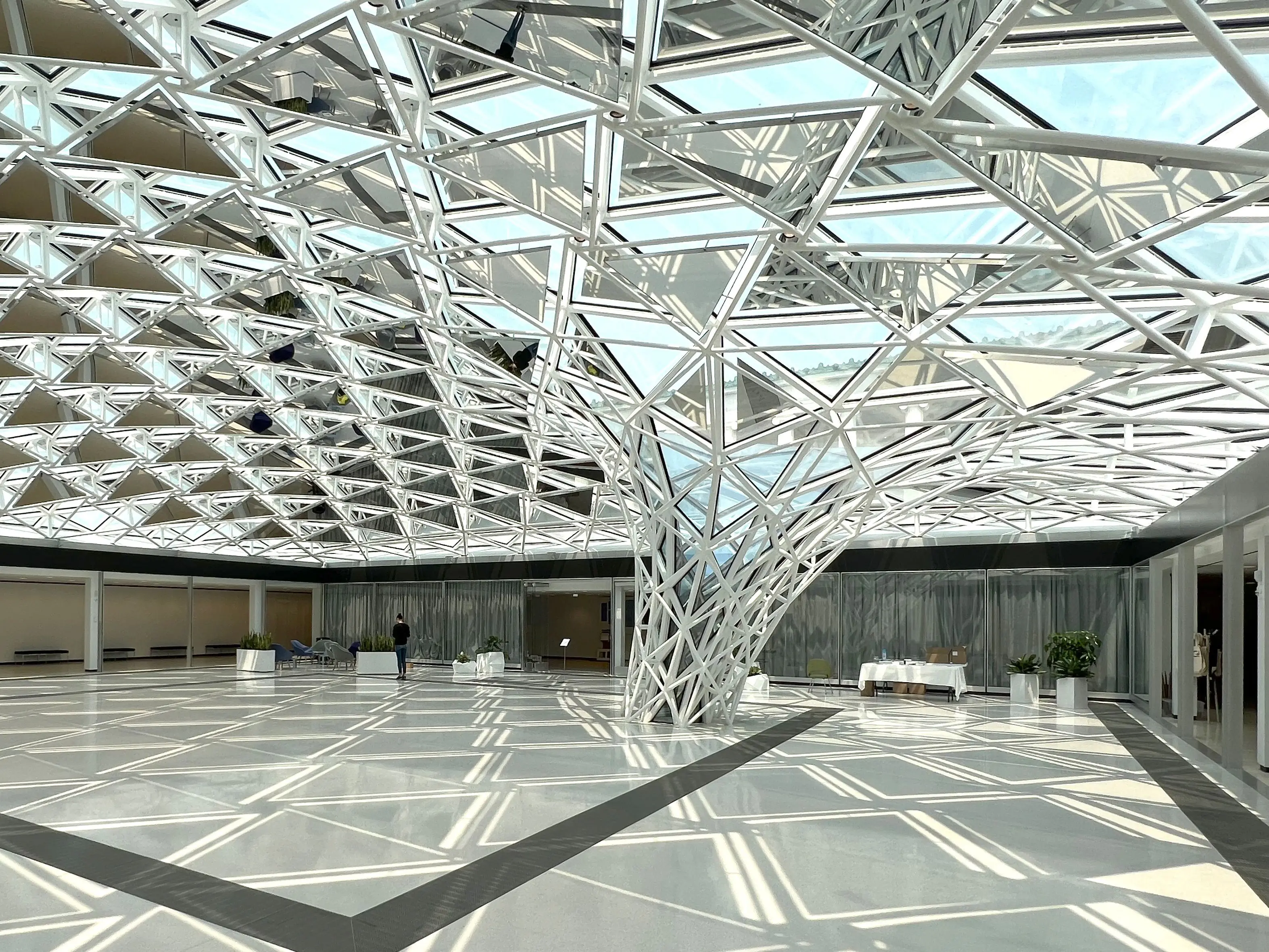 Common Sky installation by Studio Other Spaces: a geodesic glass and mirror canopy above the atrium of the Buffalo AKG Art Museum