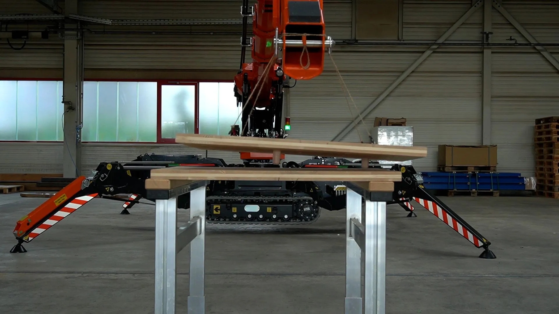 Figure 59b - Crane lowers the top panel and align the dowels with the grooves.