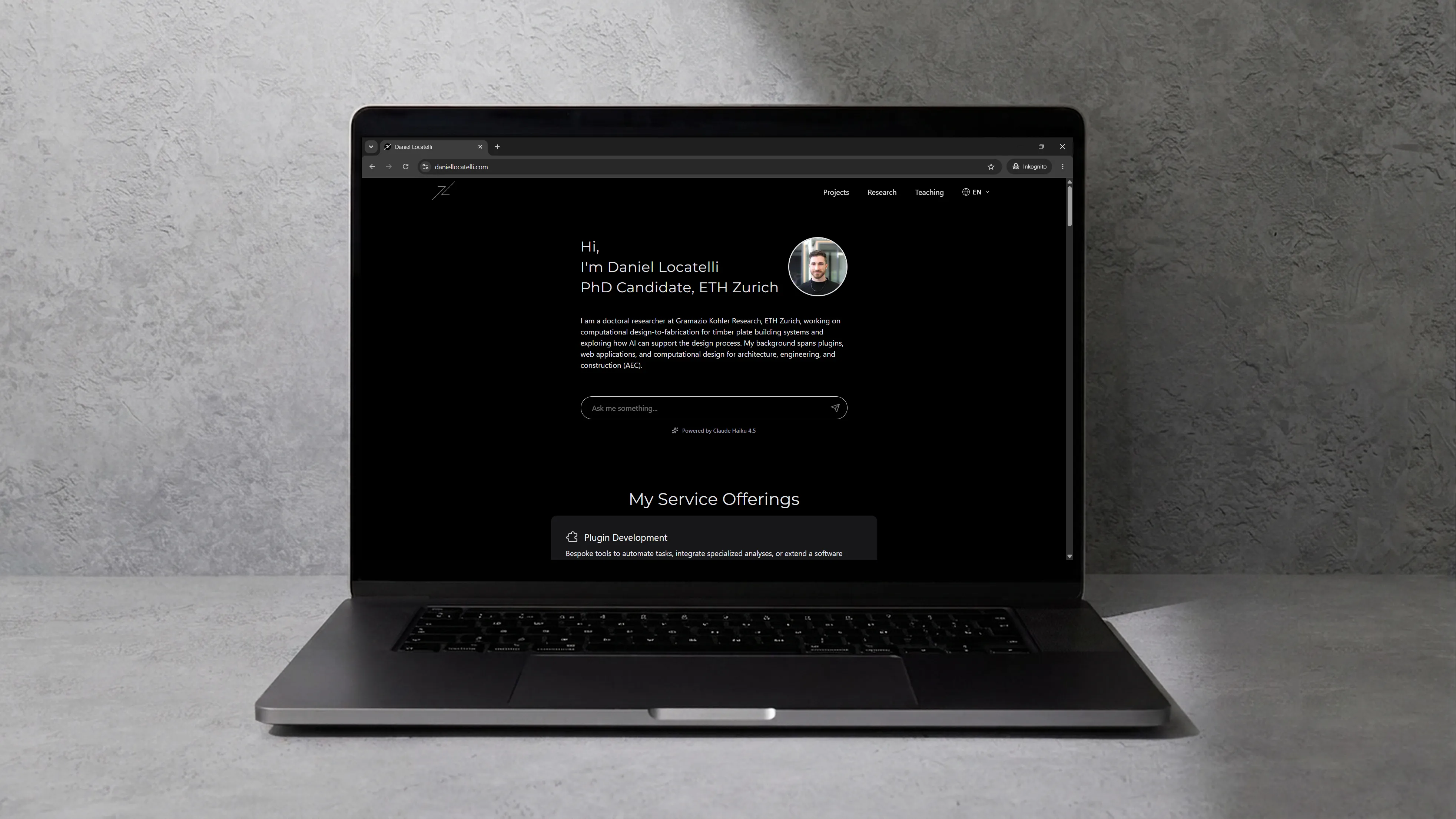The homepage of daniellocatelli.com displayed on a laptop.