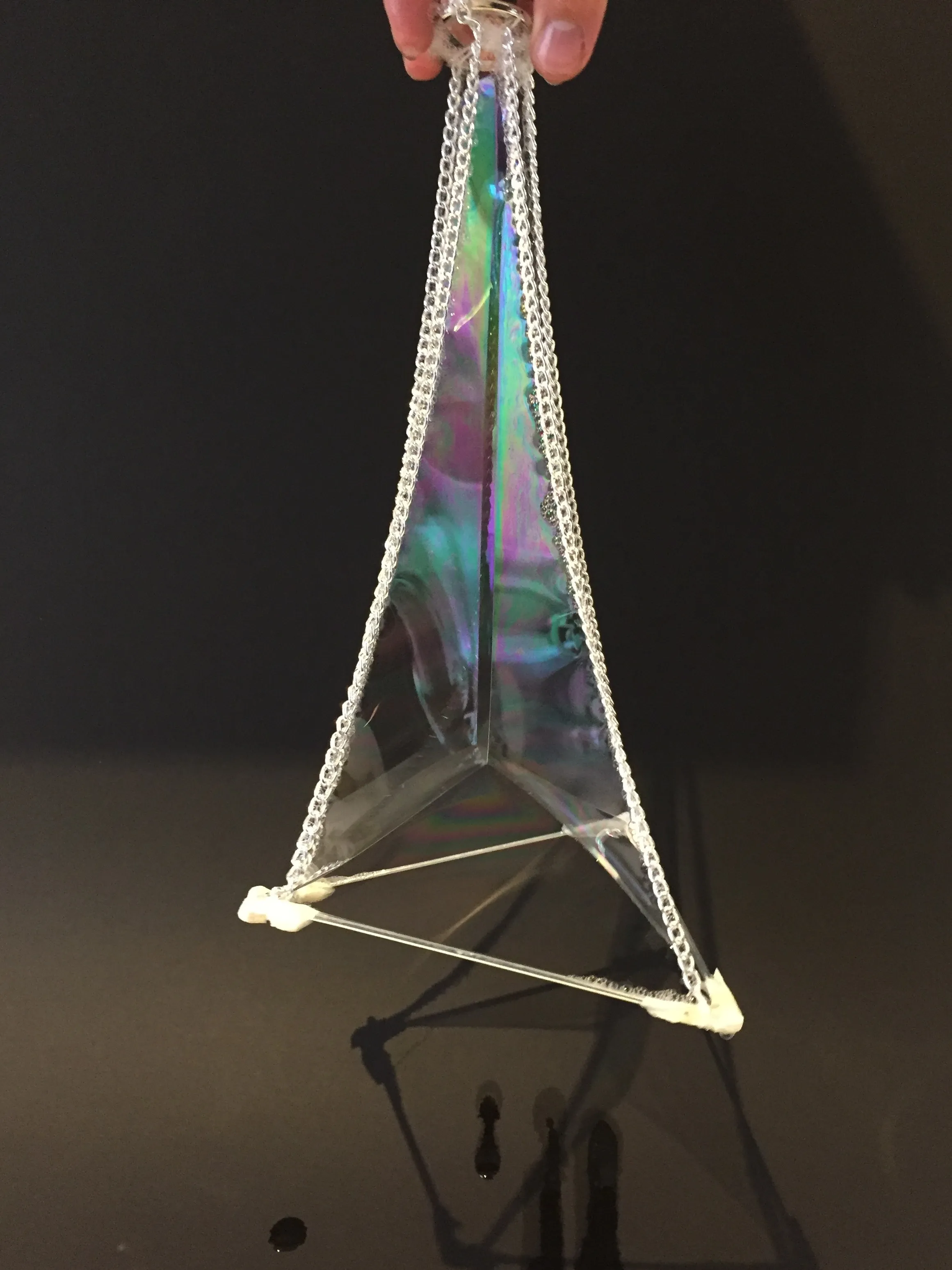 Soap film forming a pyramidal catenary on a wire frame