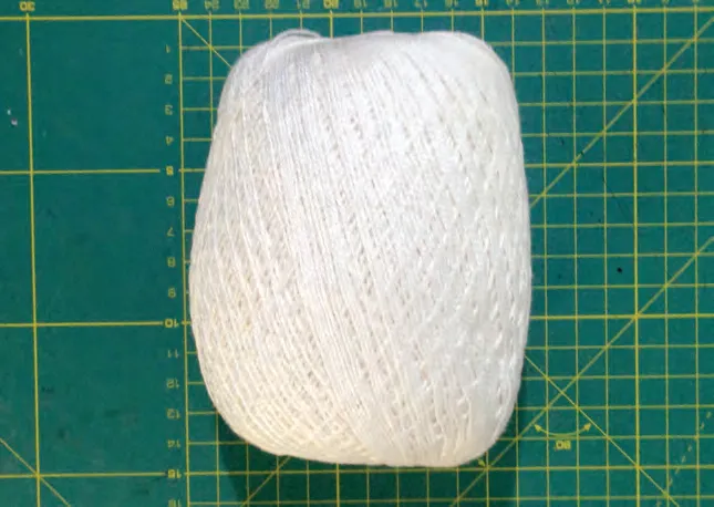 Finished bobbin with thread