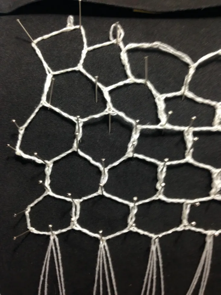 Bobbin lace pattern in production